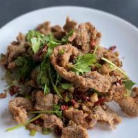Crispy Beef · Spicy. Fried sliced beef stir-fried with numbing Sichuan peppercorns and cilantro.