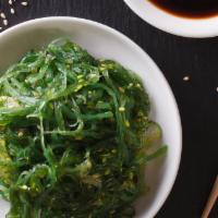 Premium Seaweed Salad · Selective seaweed salad and roasted sesame seeds