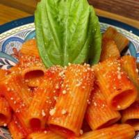 Tomato & Basil · Fresh tomato sauce and fresh basil. Served with home made focaccia bread and Parmesan cheese.