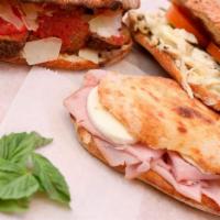 Ham & Cheese Sandwich · Homemade bread with smoked ham and mozzarella cheese.