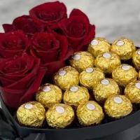 Box In Form  Of Heart · Box of different color flowers with 18 Ferrero Rocher