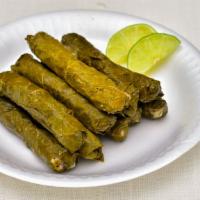 Grape Leaves With Meat · Grape leaves stuffed with rice and ground beef.