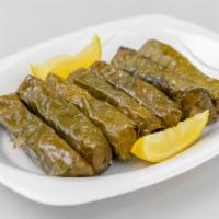 Vegetarian Grape Leaves · Grape leaves stuffed with rices and vegetables.