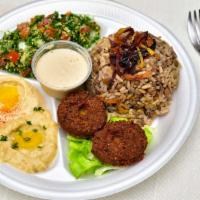 Vegetarian Combo Platter · Includes falafel, mujadara, hummus, baba ghanouj and tabouleh salad. Vegetarian.
