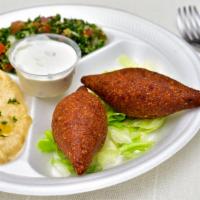 Kibbeh Platter · 2 kibbeh served with hummus, baba ghanouj and tabouleh salad.