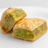 Baklava With Pistachio · Delicious dessert made with filo dough and pistachio topped with our homemade rose sugar syr...