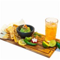 Guacamole & Chips · A piece of Mexico in our hearts! Fresh hass avocado, seasoned with condiments, diced tomato,...