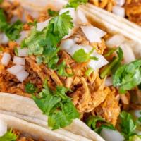 Chicken Tinga Tacos (Order Of 3) · Soft corn or flour tortilla with Chicken tinga topped with onion , cilantro and lime. Side o...
