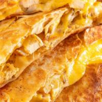  Chicken Quesadilla · 12 inches flour tortilla, stuffed with diced chicken, whole milk mozarella cheese, served wi...
