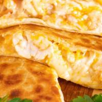 Shrimp Quesadilla · 12 inches flour tortilla, stuffed with shrimps, whole milk mozarella cheese, served with a s...