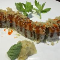 Super Crunchy Roll · Shrimp tempura cream cheese, salmon, crunch mango and eel sauce on the top.