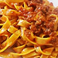 Fettuccine Bolognese · Fettuccine pasta with bolognese sauce ( minced beef, minced pork, celery, carrots, onions, a...