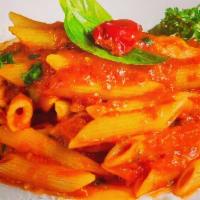 Penne Arrabbiata · Penne pasta with spicy tomato sauce, garlic & dried red chili pepper.