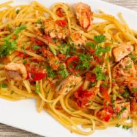 Linguine With Salmon & Shrimps  · Linguine pasta with salmon chunks, shrimps, and cherry tomatoes.