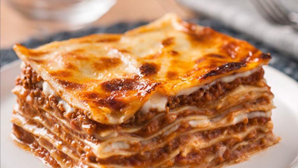Lasagna Bolognese · Layers of egg pasta with bolognese sauce (tomato sauce with minced onion, pork, and beef) besciamella mozzarella, and parmesan cheese.
Gluten-free is not available