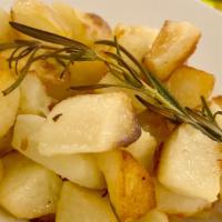 Roasted Potatoes · Roasted potatoes with fresh rosemary.