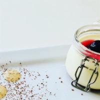 Panna Cotta · Sweet vanilla cream thickened with gelatin and berries.