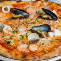 Pizza Seafood · Salmon, shrimps, calamari, clams, mussels, mozzarella cheese, tomato sauce.