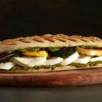 Grilled Veggie Panini · An assemblage of roasted zucchini, yellow squash, eggplant, and bell peppers served on a bag...