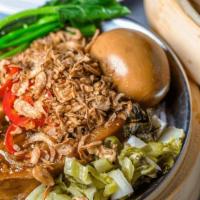 Braised Pork Belly Bowl · Thit Ko Tho - Brasied pork belly, tea egg, pickled mustard green, grilled scallions.
