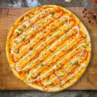 Breakin' Buffalo Pizza  · Buffalo sauce, juicy chicken, mozzarella, marinara, and chopped garlic baked on a hand-tosse...