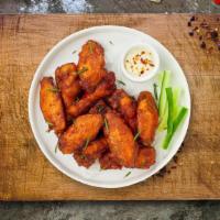 Chicken Wings · (9 pieces) Fresh chicken wings breaded and fried until golden brown.