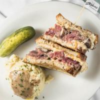 Reuben · Our best seller. Hot corned beef, swiss, sauerkraut and Russian dressing, served on grilled ...