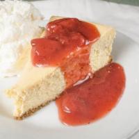 Ny Style Cheesecake · Served with strawberry sauce.