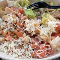 Regular Grilled Chicken Bowl · Includes pinto beans, rice, salsa, and melted Jack cheese in a flour tortilla.
