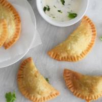 Empanadas · Handcrafted to perfection These humble hand pies are the perfect combo of savory filling and...