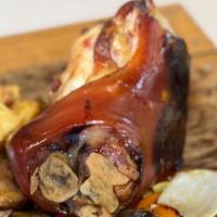 Smoked Pork Shank/Lacon De Cerdo · Our smoked pork shank is a favorite of our costumers, smoked for 6 hours prior to baking ass...