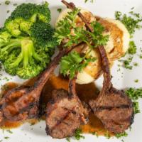 Lamb Chop · Grilled chops flavored with thyme, salt and peppers and rosemary served with jasmine rice or...