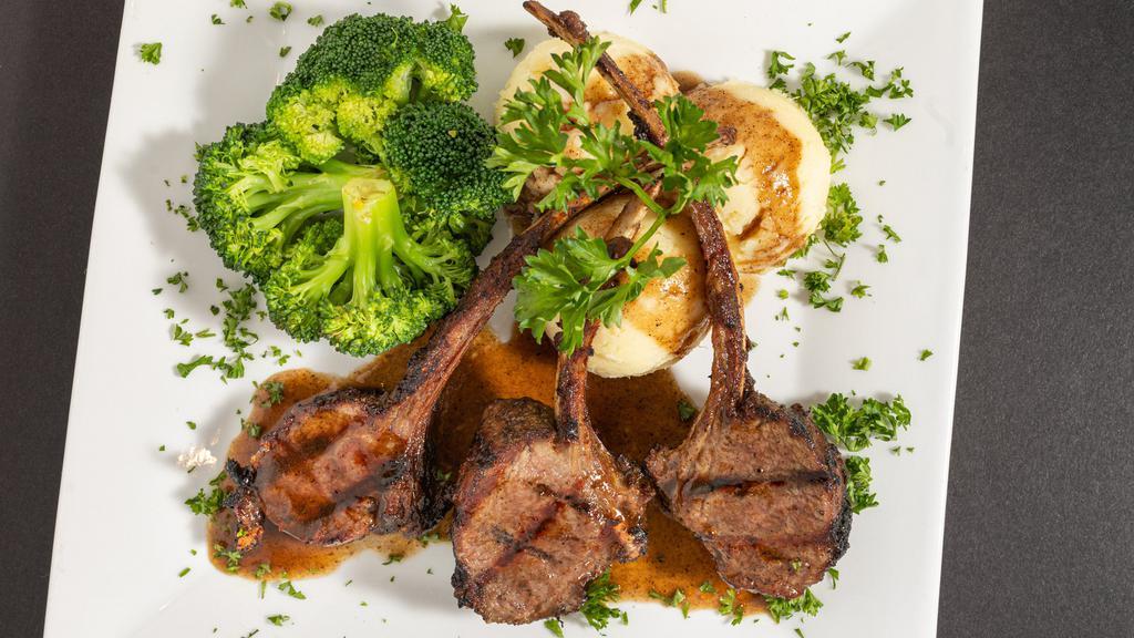 Lamb Chop · Grilled chops flavored with thyme, salt and peppers and rosemary served with jasmine rice or mashed potatoes.