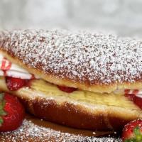 Strawberry Donut Croissant  · Our delicious donut croissant filled with whipped cream, vanilla cream , fresh strawberry sl...