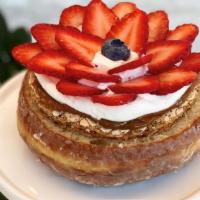 Pavlova Doughnut · Our version of the PAVLOVA cake. Walnuts, dulce de leche, meringue , whipped cream and straw...