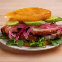  Crispy Pork Belly, Avocado, Fresh Arugula & Pickled Red Onions (Chicharron) · Very Caribbean and absolutely satisfying Crispy Pork Belly Rind Arepas are made perfectly go...