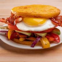  Egg, Bacon & Avocado · Delivering a tasty dose of protein, this is a staple of the Caribbean Arepa flavor. Accompan...