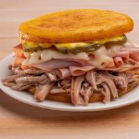  Mojo Pulled Pork, Ham, Swiss Cheese & Pickles (Cuban Arepa) · Our Cuban-style Arepa is loaded with Flavor! This tasty Arepa combo is one of our most delic...