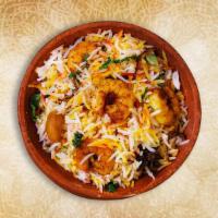 Classic Shrimp Biryani · Long grained rice flavored with fragrant spices flavored along with saffron and layered with...