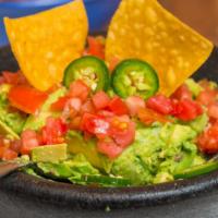 Fresh Guacamole · Made fresh to order at your table with whole avocados, tomatoes, cilantro, onions, fresh lim...