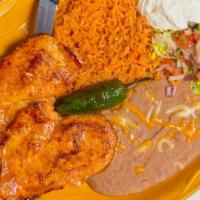 Kids Pollo Asado · With rice and beans.