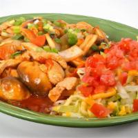 Arroz Con Pollo · Tender strips of fresh chicken breast sautéed in a special sauce with mushrooms, green onion...