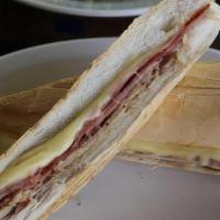 Cubano · Ham, Pork, Swiss Cheese, Mustard and Pickles on Cuban Bread