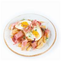 Huevos Rotos · Served two eggs,  potato, Jamón serrano