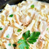 Chicken Fettuccine Alfredo · Fettuccine Pasta, Home made Alfredo sauce and Organic Chicken.