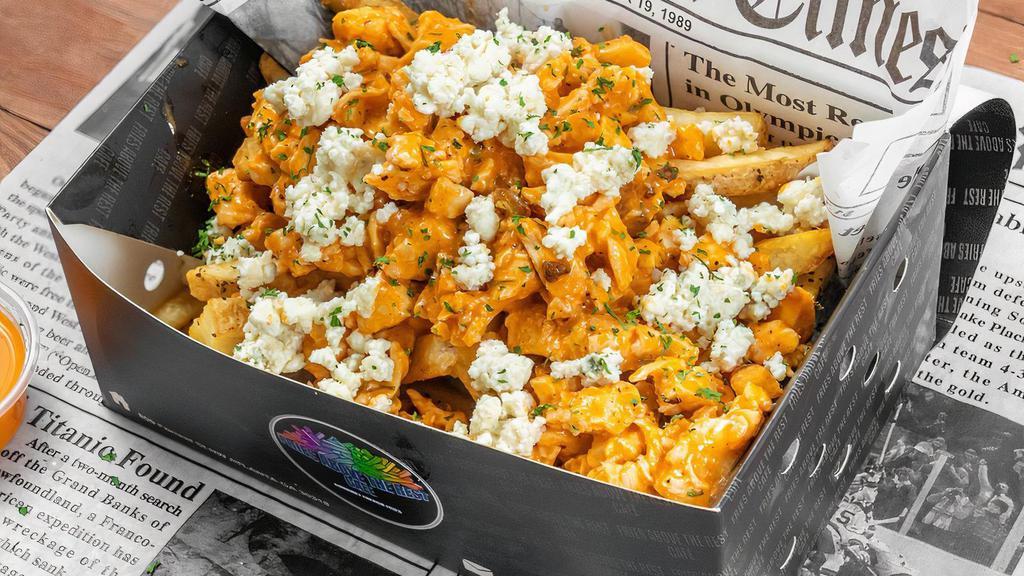 Buffalo Chicken Fries.... Vegan Option Available · Classic Straight Cut fries topped with marinated buffalo chicken,  Monterey jack cheese, sautéed onion, bacon,  
topped with blue cheese dressing & blue cheese crumbles.