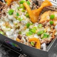 Philly Cheesesteak Fries · Crispy Sidewinder Fries Topped with Ribeye Steak, onion, green pepper with White Cheddar che...