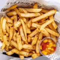 Jerk Fries · Straight Cut Fries tossed in spicy Caribbean jerk seasoning blend, and served with mango chu...