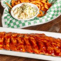 Packy'S Baby Back Ribs · Succulent fall off the bone baby back ribs smothered in BBQ sauce and served with fries and ...
