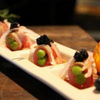 Sashimi Appetizer · 7 slices of chef's choice of assorted of fresh fish.